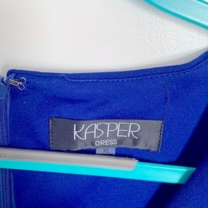 Kasper - bell sleeve high waisted dress with ruffle on the bottom of dress.